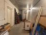 Plenty of electric outlets in this utility space that leads to backyard and river
