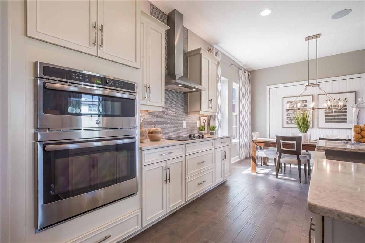 The sample photos included are of the model home and are meant to showcase the craftsmanship and design quality.