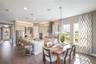 The sample photos included are of the model home and are meant to showcase the craftsmanship and design quality.
