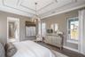 The sample photos included are of the model home and are meant to showcase the craftsmanship and design quality.