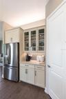 The sample photos included are of the model home and are meant to showcase the craftsmanship and design quality.
