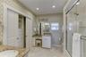 Primary Bathroom With Closet