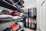 Enjoy the convenience of dual walk-in closets with dedicated storage for two.