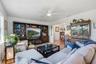 Picture movie nights or a quiet evening at home in this inviting family room, with generous space for comfortable seating and your entertainment setup