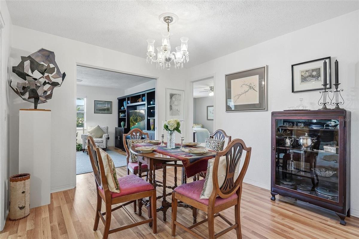 From everyday meals to special occasions, the dedicated dining area offers an inviting place to gather beside the family room.