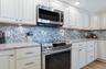 BEAUTIFULLY APPOINTED KITCHEN AND STAINLESS STEEL APPLIANCES