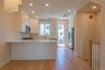 This sleek & stylish kitchen is a chef's dream, providing ample storage & workspace for all your culinary adventures.