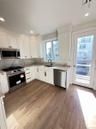 Deck off the kitchen offers the perfect setting for al fresco dining or entertaining.