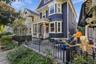 Blue clapboard siding with fish scale shingle accents