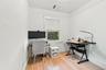 Hardwood flooring, painted walls, window with blinds, and detailed crown molding