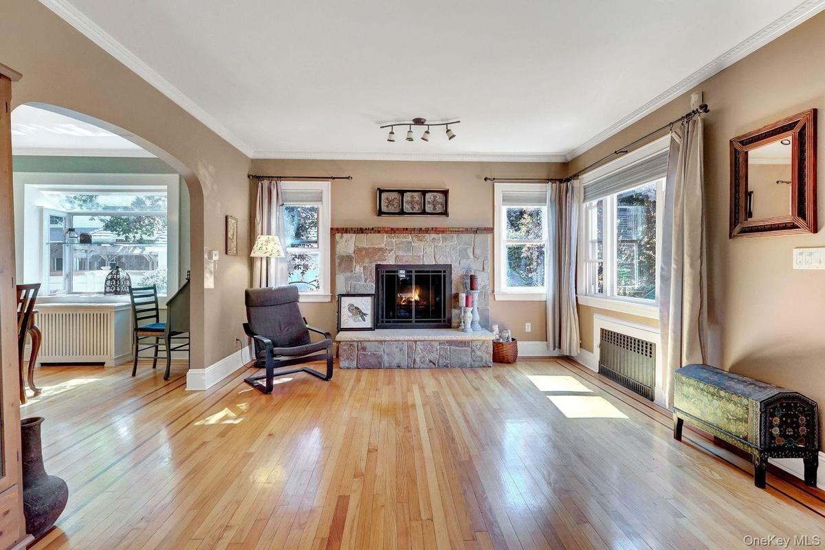 Living room with wood burning fireplace