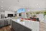 Custom Kitchen Cabinets and Drawers hold an impressive array of Kitchen Gadgets to please the most demanding chef.