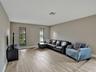 Spacious sunken Living room with lots of light!
