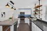Contemporary concrete island adds function & style