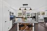 Kitchen has unique artistic touches throughout