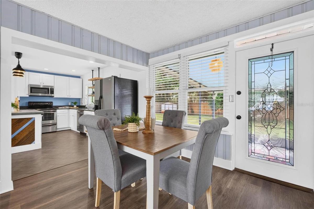 Den has space for dining area and additional living area