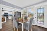 Den has space for dining area and additional living area