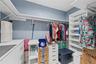 PRIMARY BATHROOM WALK-IN CLOSET, ONE OF TWO