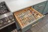 You see this detail in all of the cabinets. There is also a clear cabinet protector underneath for easy cleaning.