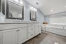Newly redesigned with double sinks and a huge soaking tub.