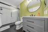 The guest bathroom has been updated with an easy access walk in shower.