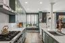 Notice the Viking stove and slate floors.