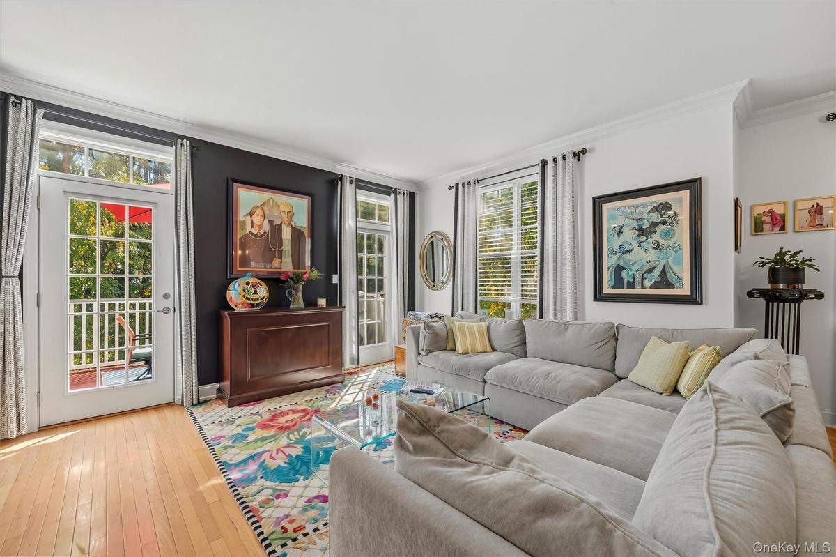 With windows everywhere and a French door leading out to your private deck overlooking the trees.