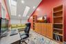 The third floor loft space with skylights serves as the perfect home office. On both sides are two huge walk in storage rooms.