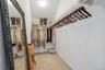 A deep walk in closet in the guest bedroom is just one of the luxurys this home has.