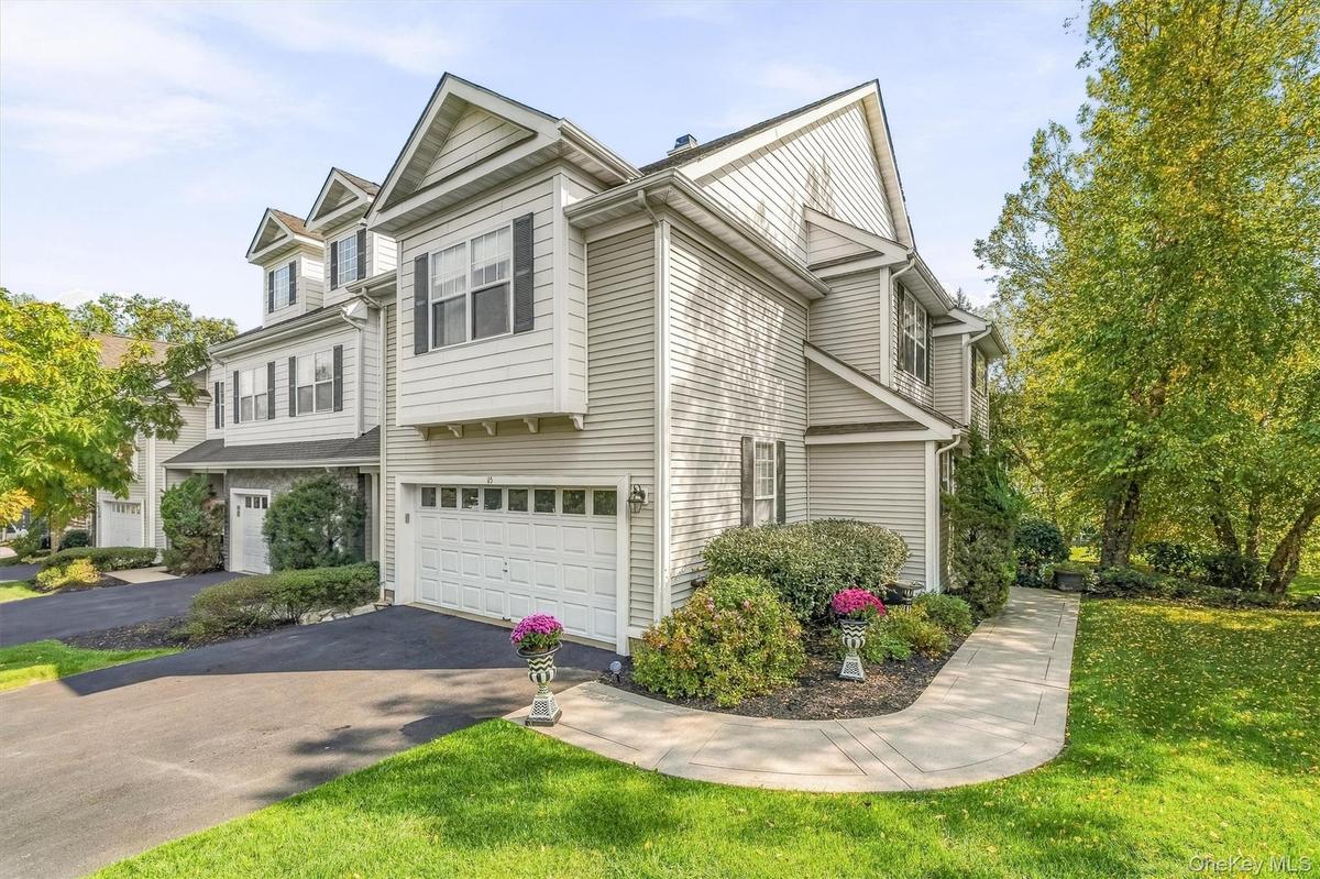 Fall in love!  It's  finally here! Over 3000 sq ft of gorgeous living space! Welcome to 15 Country Club Drive.