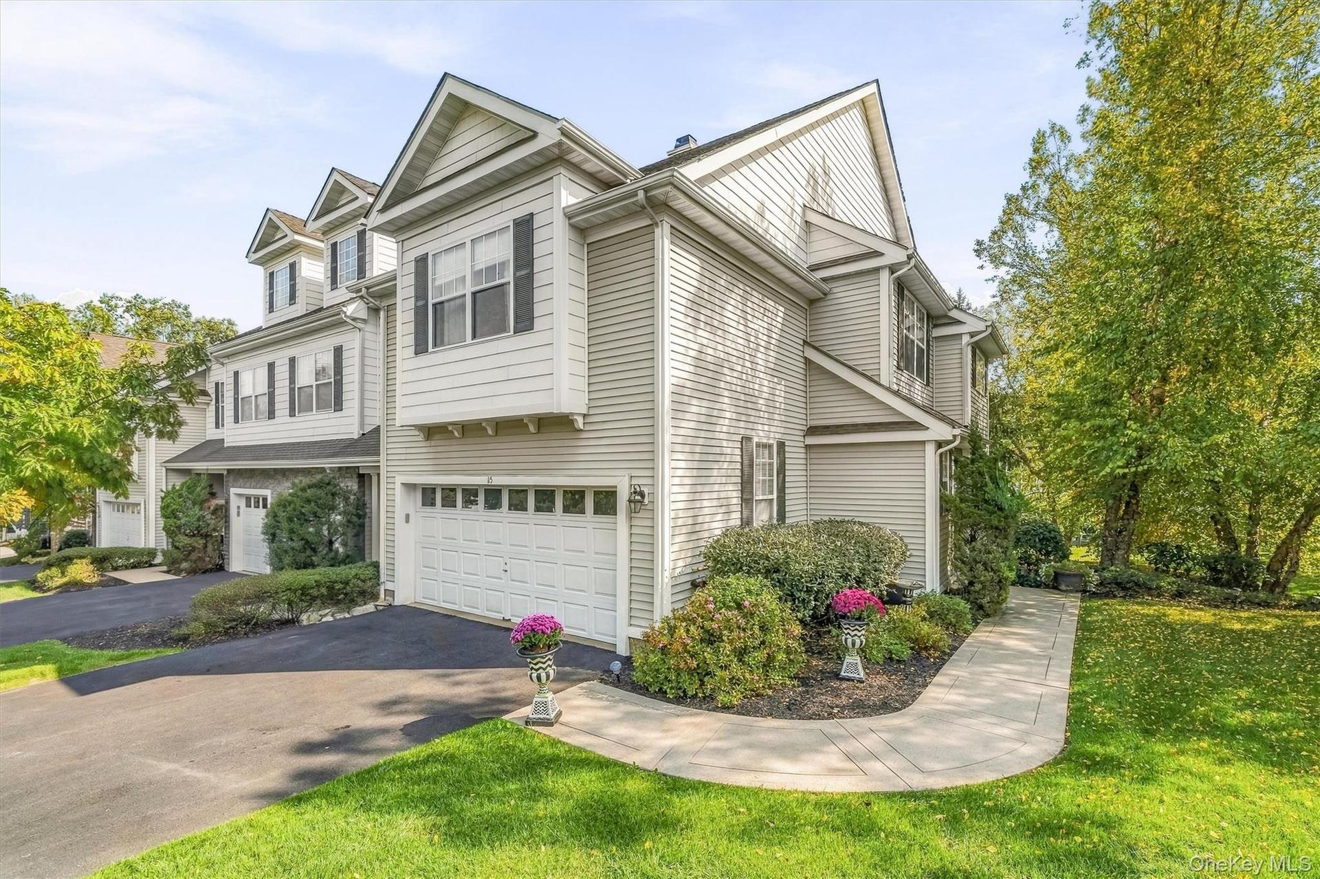Fall in love!  It's  finally here! Over 3000 sq ft of gorgeous living space! Welcome to 15 Country Club Drive.