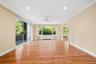 Large, sunlit living room.