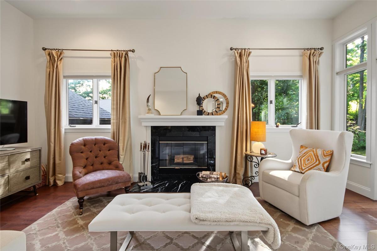 Cozy/Contemporary Livingroom with a Fireplace