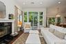 Bright Livingroom with Natural Light and Sliders to Private Patio