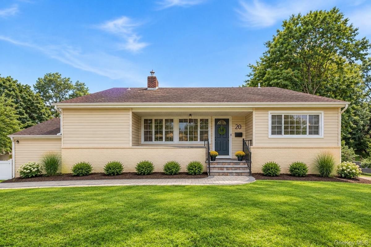 Digitally enhanced to show front of house without bushes.