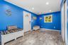 Entry foyer with Wood-finish flooring, recessed lighting, and a window with natural light