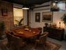 Full basement with poker table(not included). (partially virtually staged)