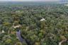 Withlacoochee River abuts the property. Roof top pictured is the subject property.