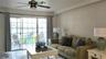 Living Room has sliding doors to a Private Deck overlooking the pool and waterfront.