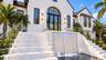 Grand waterfall entrance. Virtually staged.