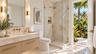 Pool access bathroom. Virtually staged.