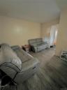 Living room featuring wood finished floors