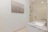 Guest Bathroom, white vanity with a marble countertop and undermount sink