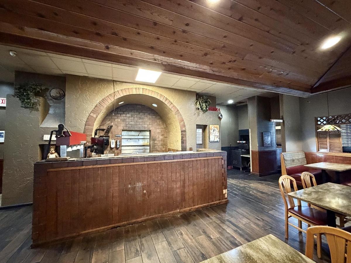 Dual pizza ovens and service counter