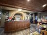 Dual pizza ovens and service counter