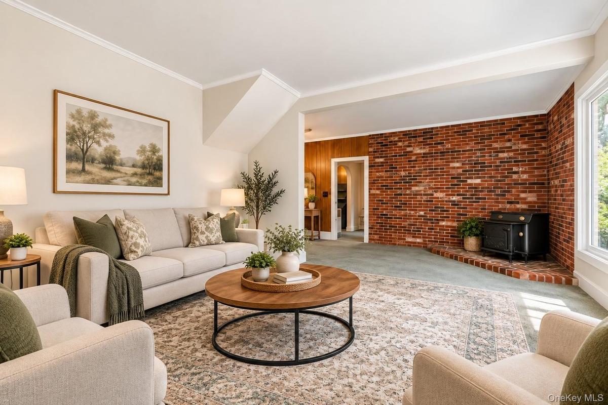 Virtually Staged Open Living RoomStep into this beautifully spacious, open-concept living room, thoughtfully virtually staged to showcase its warmth, 
