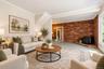 Virtually Staged Open Living RoomStep into this beautifully spacious, open-concept living room, thoughtfully virtually staged to showcase its warmth, 