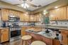 The kitchen was updated with granite counters, LVP floors and a deep farmhouse sink.