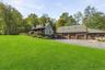 An expansive green lawn and large parking area for you and your guests.