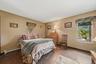 Large first floor bedroom has generous closet space, LVP floors and plenty of light.